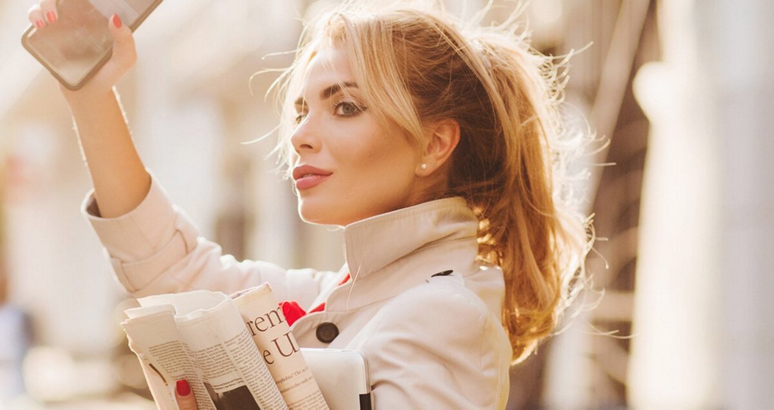 Blonde woman with a messy high ponytail