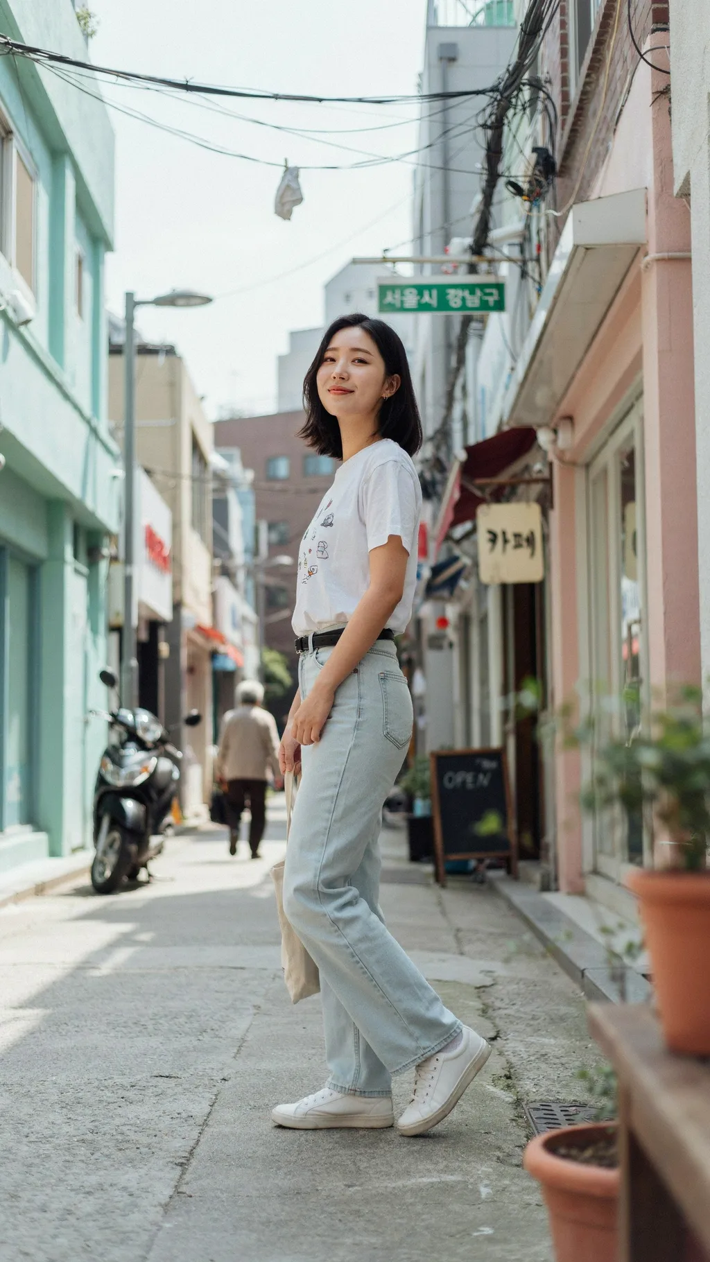 Wide-Leg Jeans with a Tucked Graphic Tee Korean street style outfit