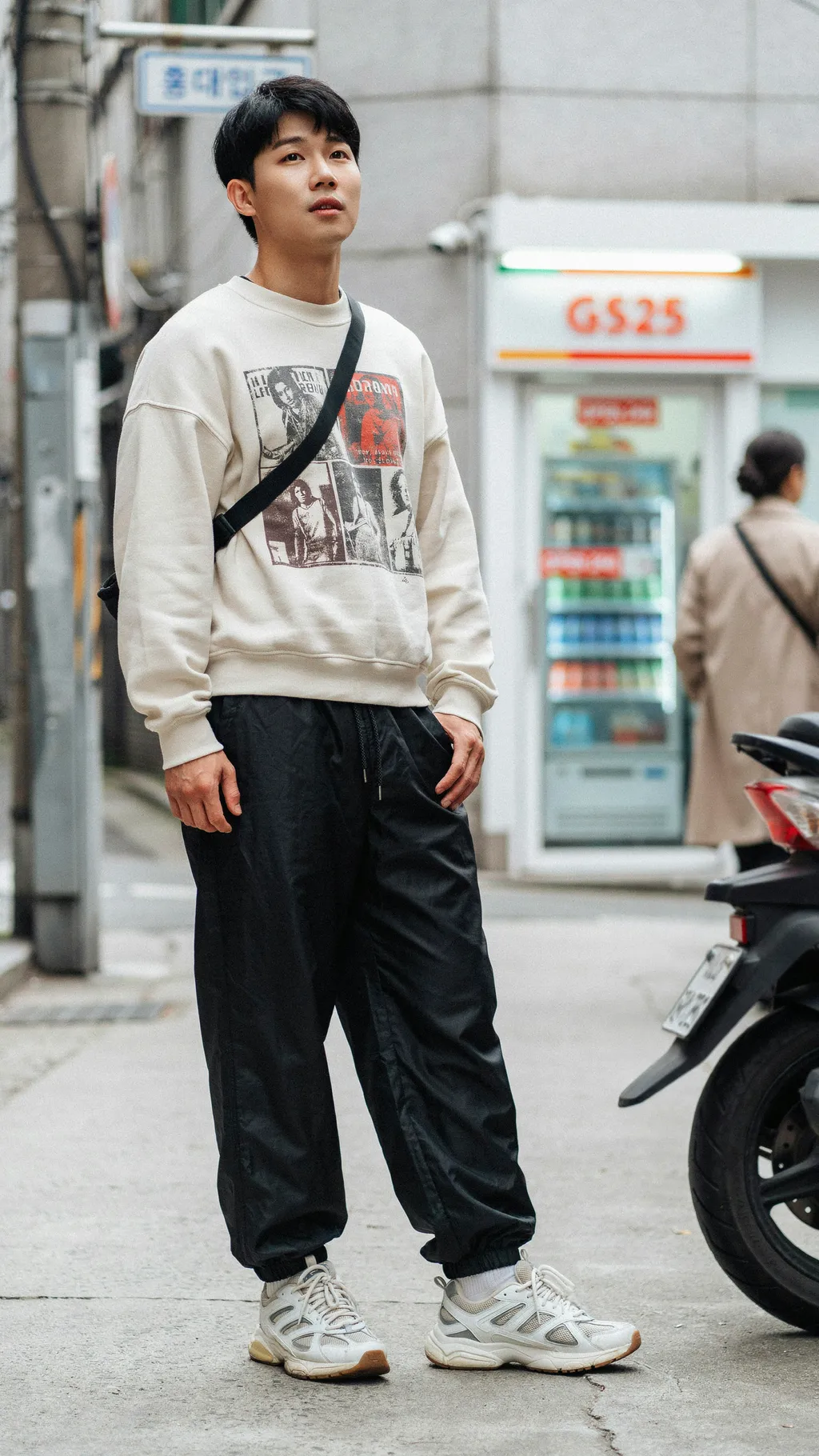 Graphic Sweatshirt and Parachute Pants Korean street style outfit