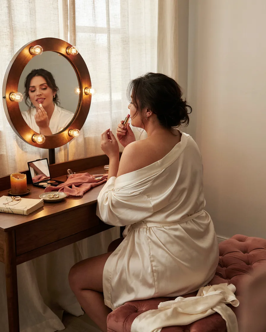 Getting Ready at the Vanity plus size boudoir photoshoot idea